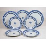 Set of seven Chinese chargers and plates
