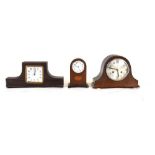 Three mantel clocks