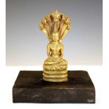 South East Asian bronze Buddha with cobra