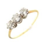 Yellow metal (18ct) three-stone diamond ring, 2.3g gross approx