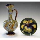 Doulton Lambeth ewer, together with a Moorcroft Hibiscus pattern pin dish