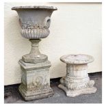 Composite stone garden urn on pedestal base, together with a column top