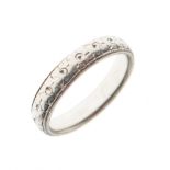 Unmarked white metal floral engraved wedding band
