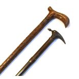 Carved antique sword stick and pick-handled stick (2)