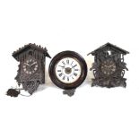 Two cuckoo clocks (bits) and a postman alarm clock