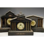 Three black slate temple clocks