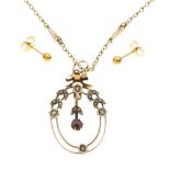 Early 20th Century pendant set purple stone and seed pearls, unmarked, on 9ct gold fancy-link chain