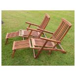 Pair of teak fold-up patio sun loungers