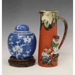 Japanese Sumida ware jug and a ginger jar with blue and white prunus decoration