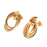 Pair of yellow metal stud earrings