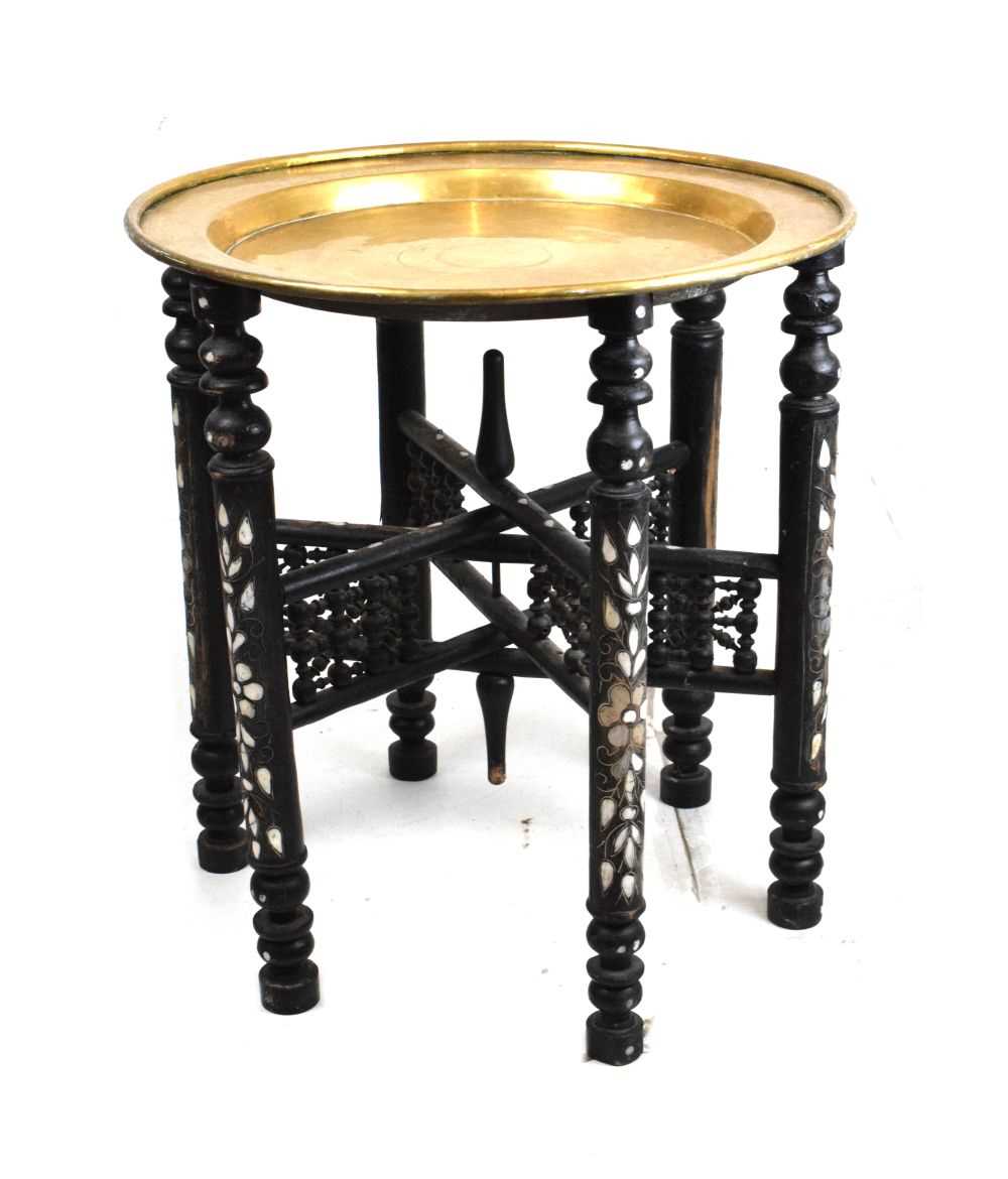 Ebonised and inlaid brass top Benares style table