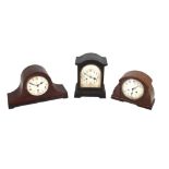 Three mantel clocks