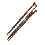 Four various walking sticks - Dog's head, two clasped hands, etc (4)