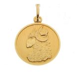 Yellow metal zodiac medallion, depicting Aries, stamped '750'