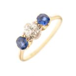 Yellow metal, sapphire and diamond three-stone ring