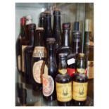 Quantity of various commemorative beer, miniature port and whisky bottles (12)