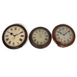 Three wooden framed circular wall clocks