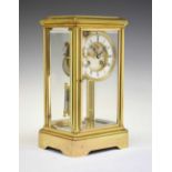 French brass four-glass mantel clock, visible Brocot