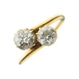 Two-stone diamond crossover ring,