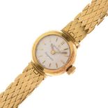 Omega Ladymatic - Lady's 18ct gold bracelet watch