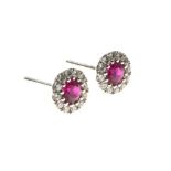 Pair of ruby and diamond cluster earstuds,