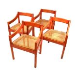 After Magistretti - Four Caramite chairs with cane seats