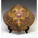 Antique 'worked' turtle shell painted with double-headed eagle armorial