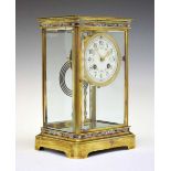 19th Century French brass and champlevé enamel four-glass mantel clock