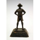 Bronze figure of a Boy Scout on a wooden plinth