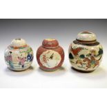 Three Oriental ginger jars with covers