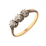 Yellow metal, three stone diamond ring, stamped '18ct'