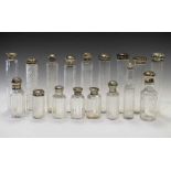 Seventeen late Victorian and 20th Century silver-mounted dressing table or toiletry bottles, etc