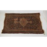 Two early 20th Century Middle Eastern (Persian) wool rugs
