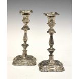 Pair of George V silver candlesticks