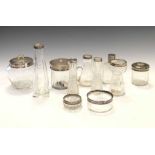 Eleven late Victorian and 20th Century silver-mounted dressing table/toiletry bottles, etc