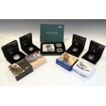 Four Royal Mint £5 silver proof coin packs