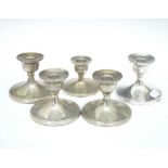 Set of four George VI silver table candlesticks