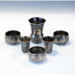 Set of three Russian silver salts together with two Russian silver vodka cups, etc