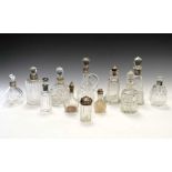 Twelve late Victorian and 20th Century silver-mounted dressing table/toiletry bottles, etc