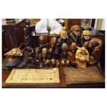 Group of African and other carved wooden figures, etc