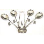 Four Edward VII silver spoons, three silver thimbles, Victorian sugar tongs and a decanter label