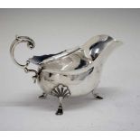 Edward VII silver sauce boat with flying scroll handle