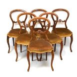 Set of six Victorian walnut balloon-back chairs