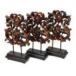 Three decorative wooden baroque-style mounted sculptures