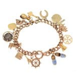 9ct gold curb link bracelet, attached various charms