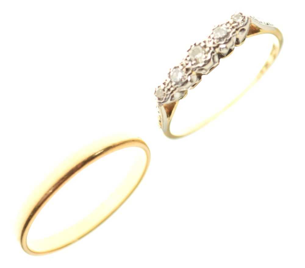 22ct gold wedding band and 18ct yellow metal ring set five white stones