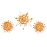 Turkish yellow metal starburst brooch and matching clip-on earrings