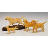 Beswick model of a Labrador in matt finish, together with three other Beswick Labrador figures