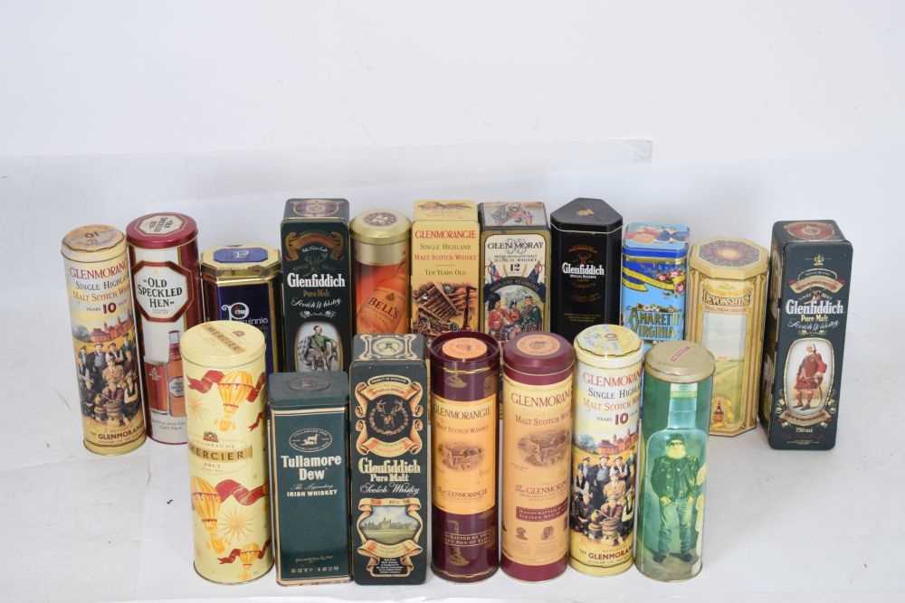Collection of empty whisky tins