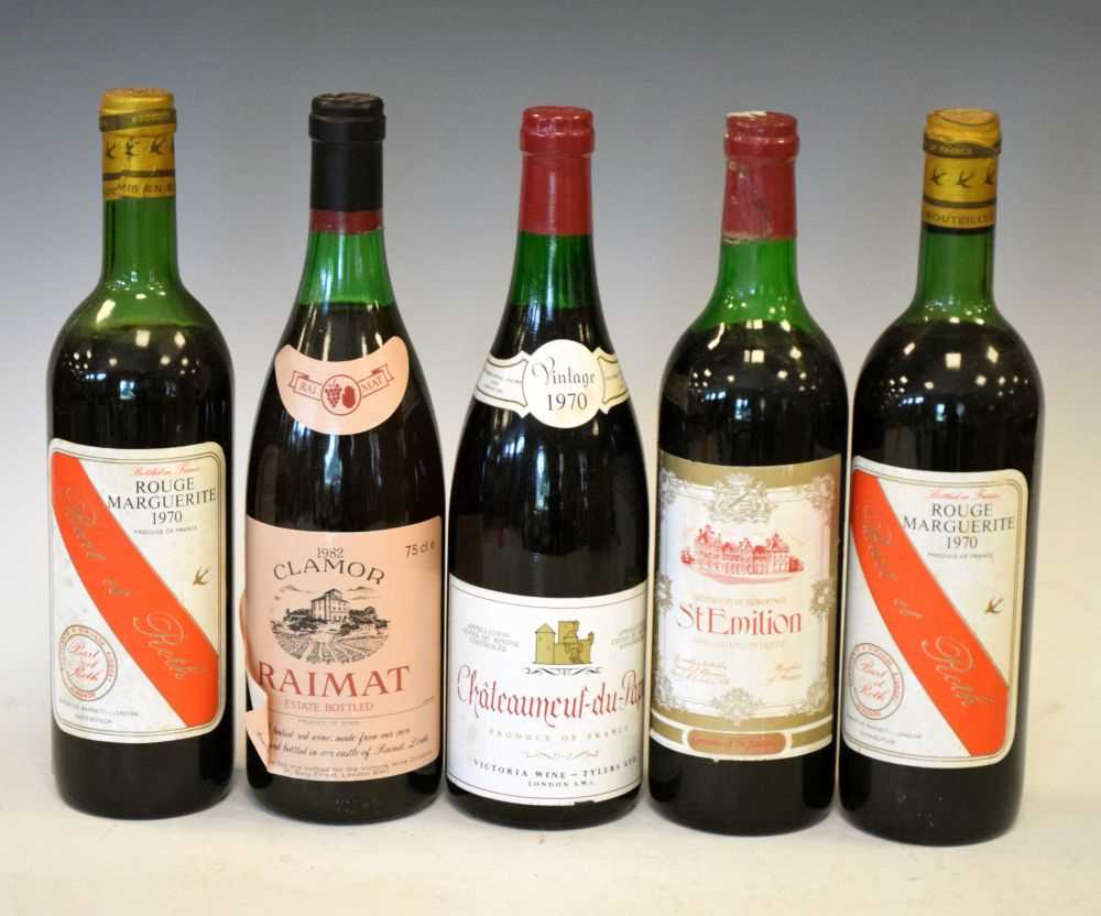 Five bottles of French red wine
